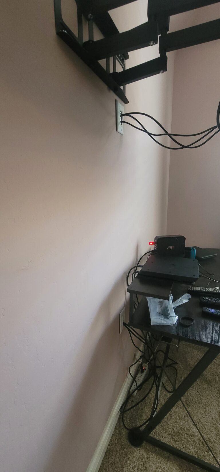 On this job, A4O ran the TV wires through the wall to give a clean look to our client's setup; with enough slack to allow the TV to have full range motion on the articulating mount used. TV Mounting Service. Kern County, Bakersfield, CA, USA.