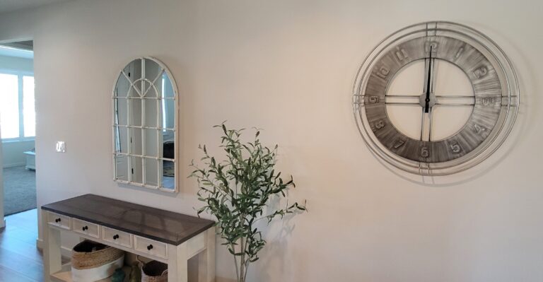 Decorative mirror and clock A4O hung in our client's entry way. Decor Hanging. Kern County, Bakersfield, CA, USA
