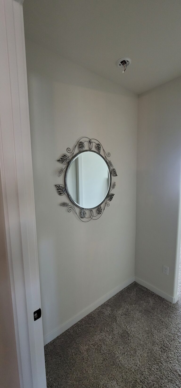 Mirror hung in our client's master bedroom's vestibule. Decor Hanging. Kern County, Bakersfield, CA, USA